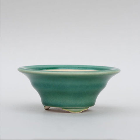 Turquoise flared pot