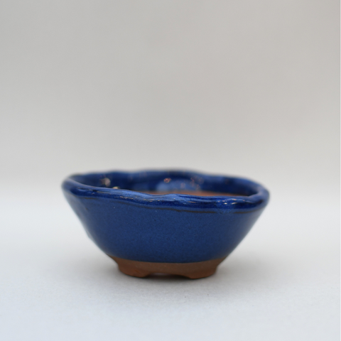 Textured blue flared pot