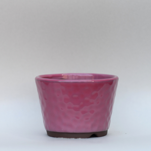 Bright pink textured pot