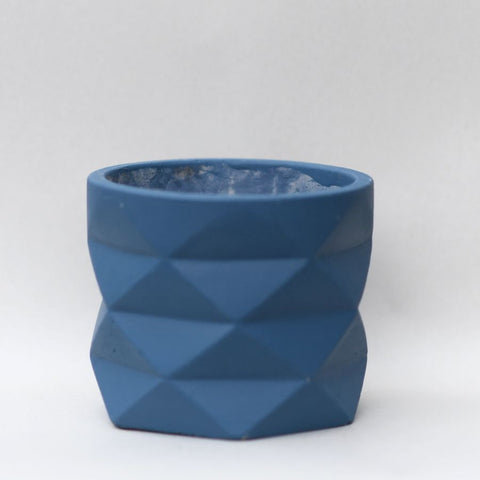 Blue asymmetrical vase pot holder